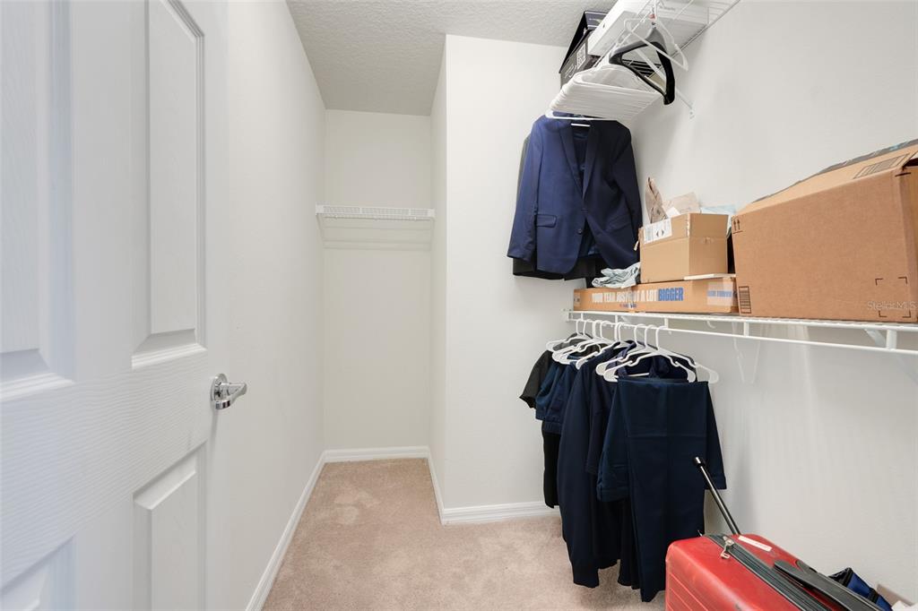 2611 Hilltop Loop Apopka, FL 32712 - Photo 30 of 46 a view of walk in closet