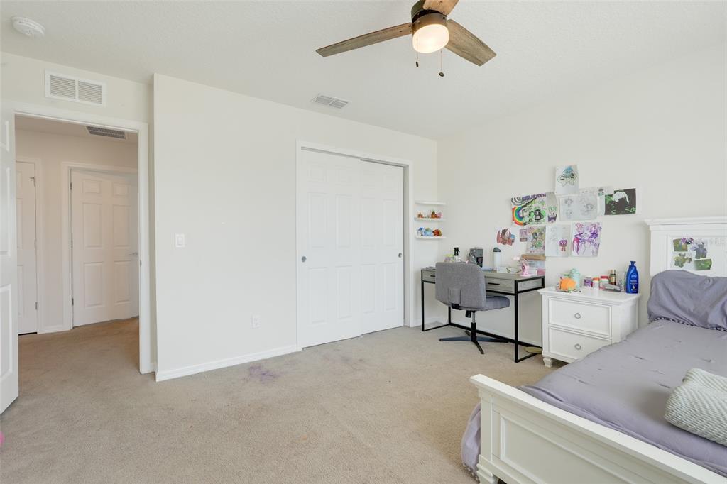 2611 Hilltop Loop Apopka, FL 32712 - Photo 31 of 46 a living room with furniture and a window