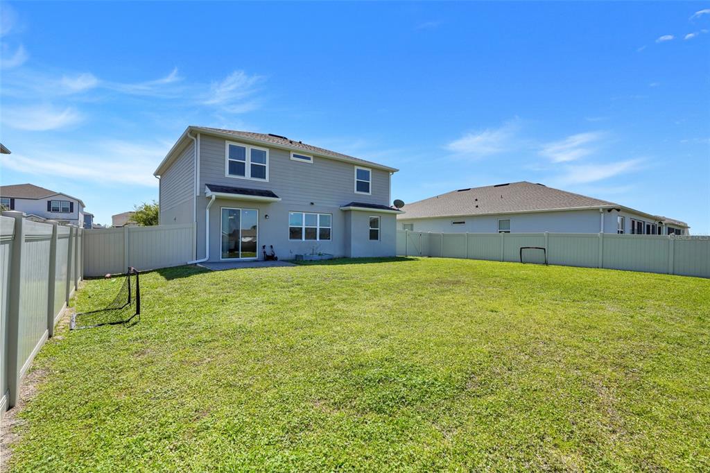 2611 Hilltop Loop Apopka, FL 32712 - Photo 37 of 46 a house view with a outdoor space