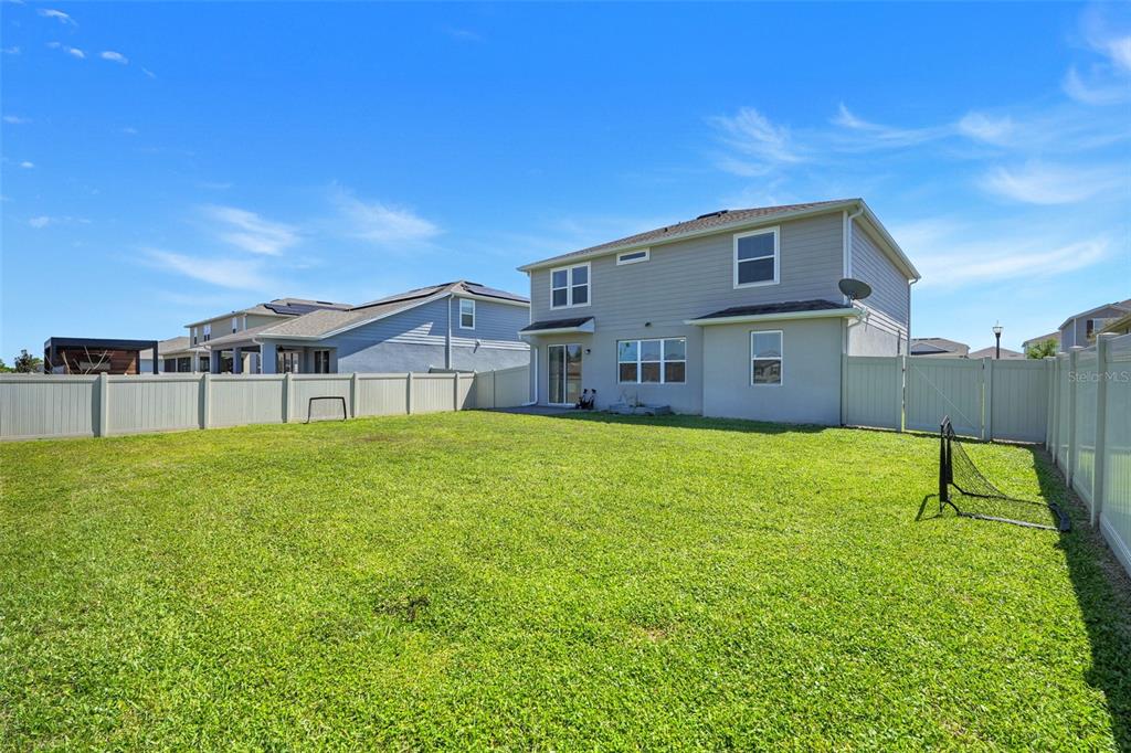 2611 Hilltop Loop Apopka, FL 32712 - Photo 38 of 46 a house view with a outdoor space