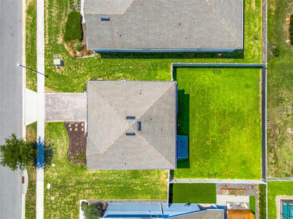 2611 Hilltop Loop Apopka, FL 32712 - Photo 39 of 46 an aerial view of a house with a garden