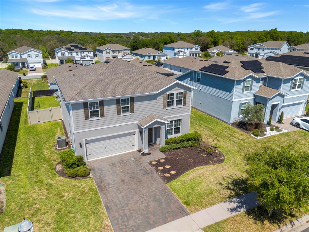 2611 Hilltop Loop Apopka, FL 32712 - Photo 4 of 46 an aerial view of residential houses with outdoor space