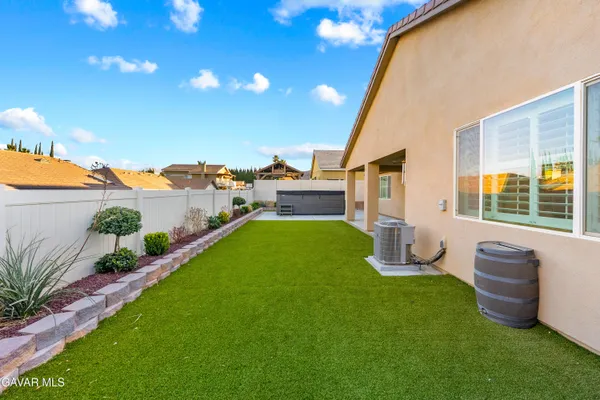 a view of a house with a ocean view