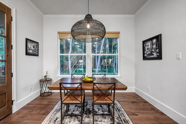 a kitchen with a sink stainless steel appliances and counter space