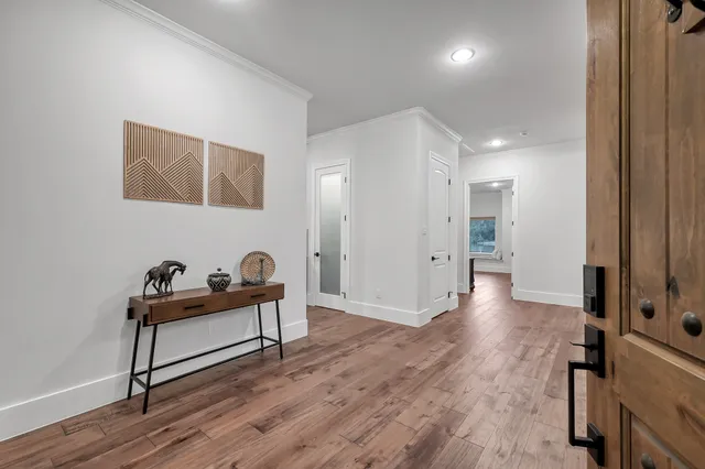 a hallway with a wooden floor
