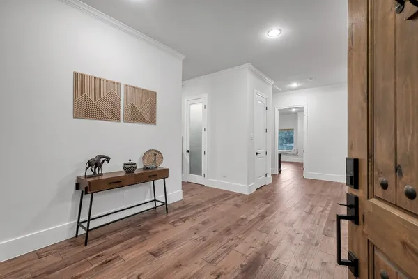 a hallway with a wooden floor