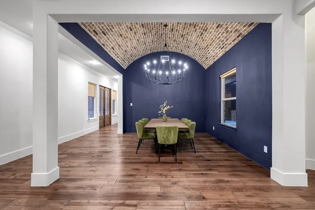 a workspace with furniture and window