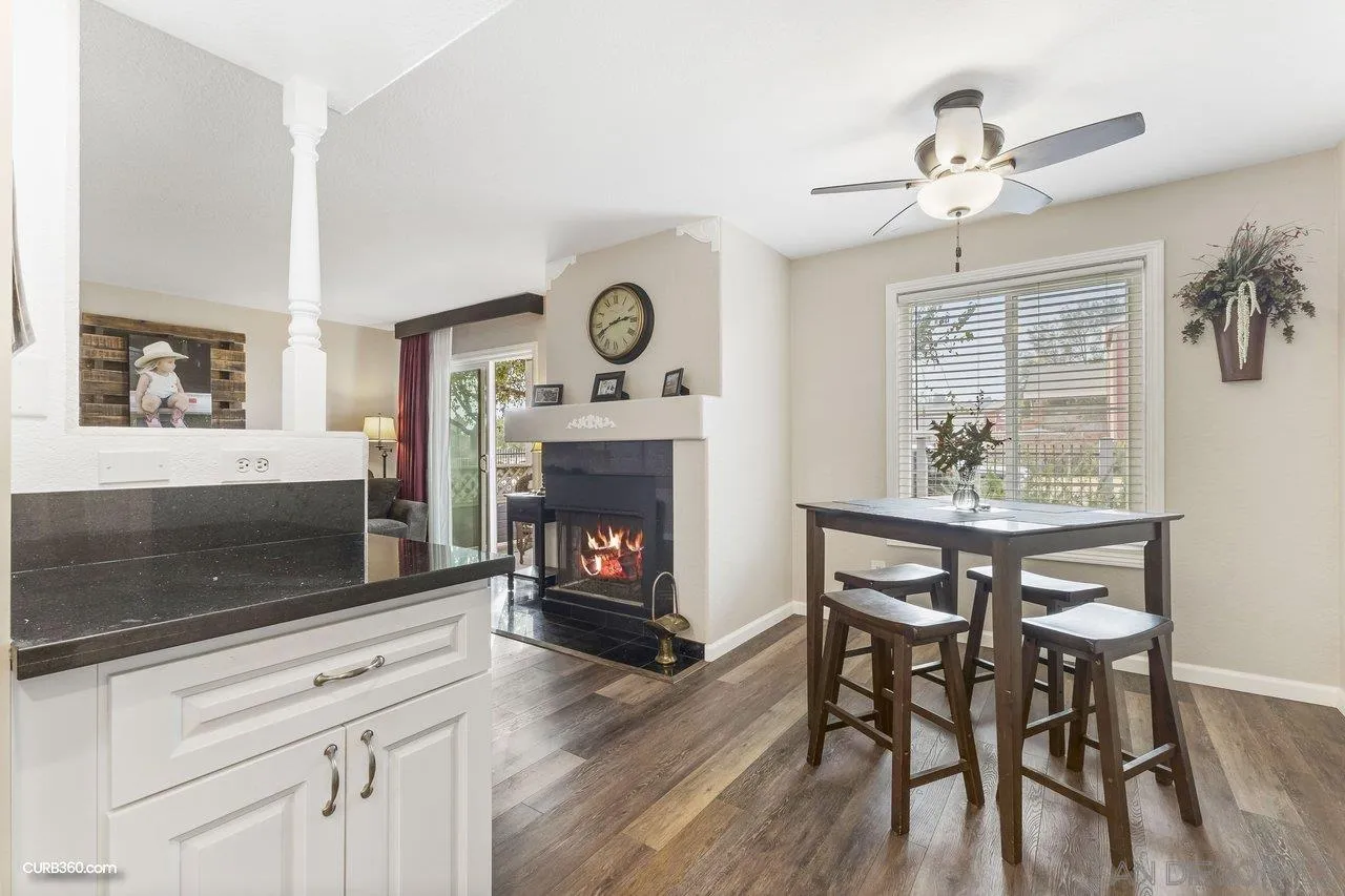 13967 Midland Road Poway, CA 92064 - Photo 13 of 37 a living room with furniture and a fireplace