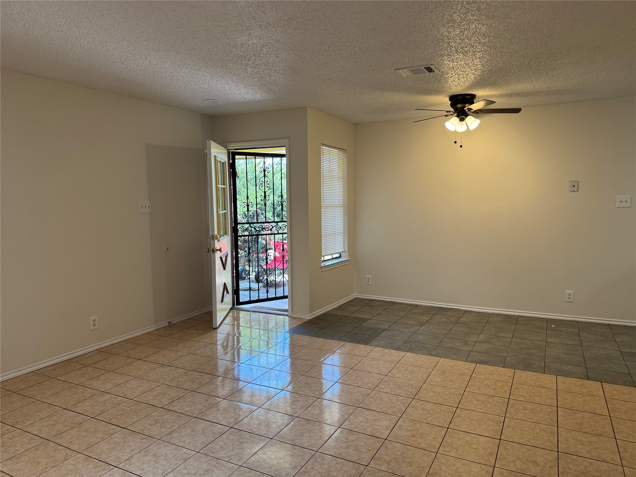 12503 Turtle Rock Road, Unit B Austin, TX 78729 - Photo 5 of 17 an empty room with kitchen view