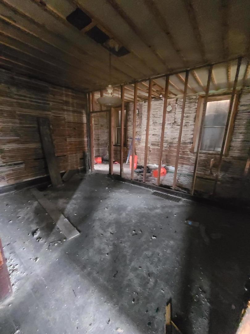 369 South 4th Avenue Kankakee, IL 60901 - Photo 12 of 15 a view of room with stairs and wooden floor