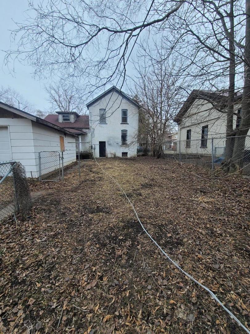 369 South 4th Avenue Kankakee, IL 60901 - Photo 4 of 15 a view of a house with a yard