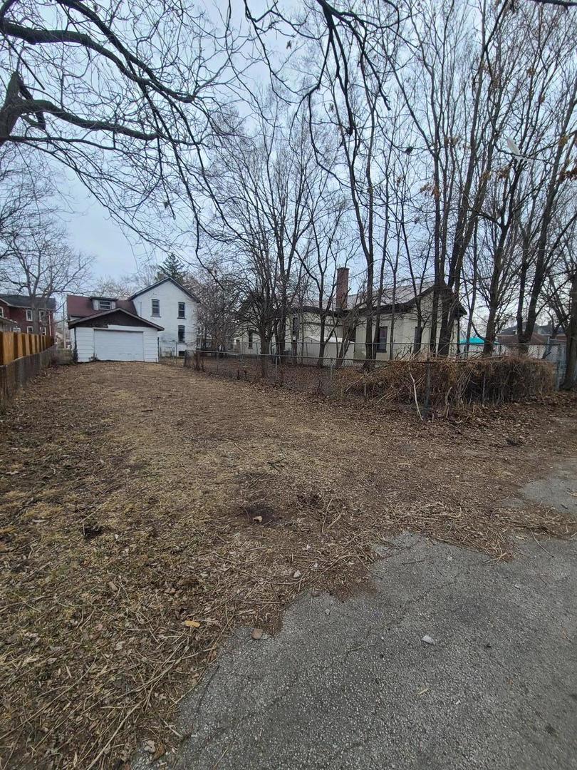 369 South 4th Avenue Kankakee, IL 60901 - Photo 5 of 15 a view of a yard covered with snow