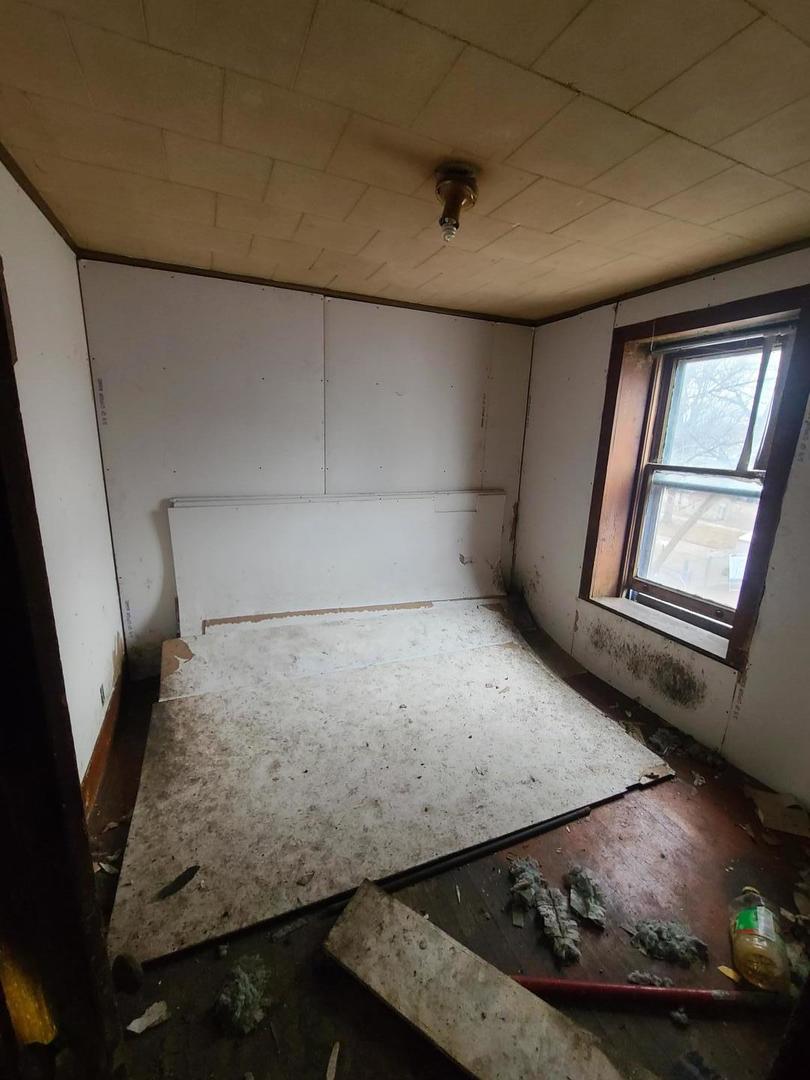 369 South 4th Avenue Kankakee, IL 60901 - Photo 7 of 15 a view of a room with an empty space and window
