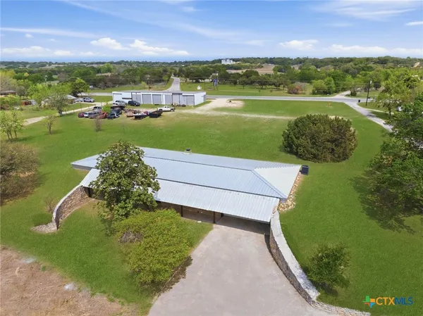a view of a garden with houses