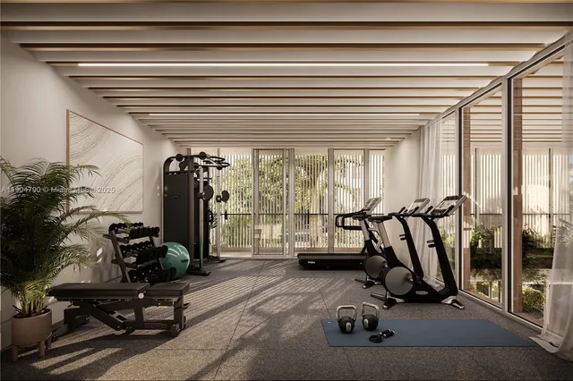 a view of a room with gym equipment