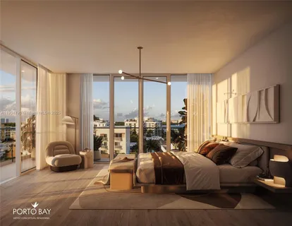 a living room with furniture and large windows