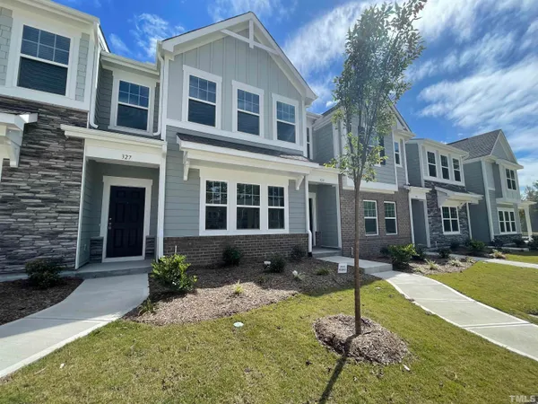 a house view with a garden space