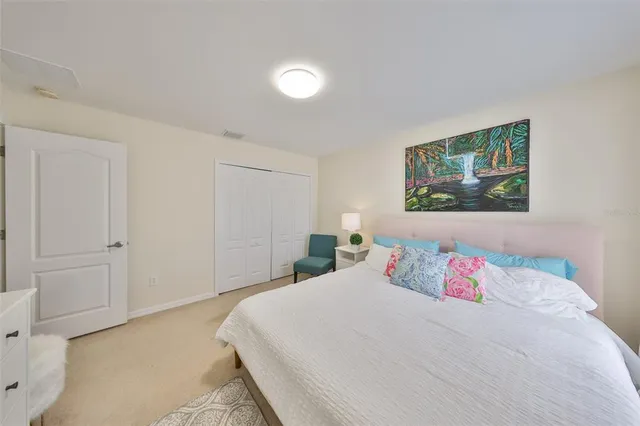 a bed room with a bed and a couch