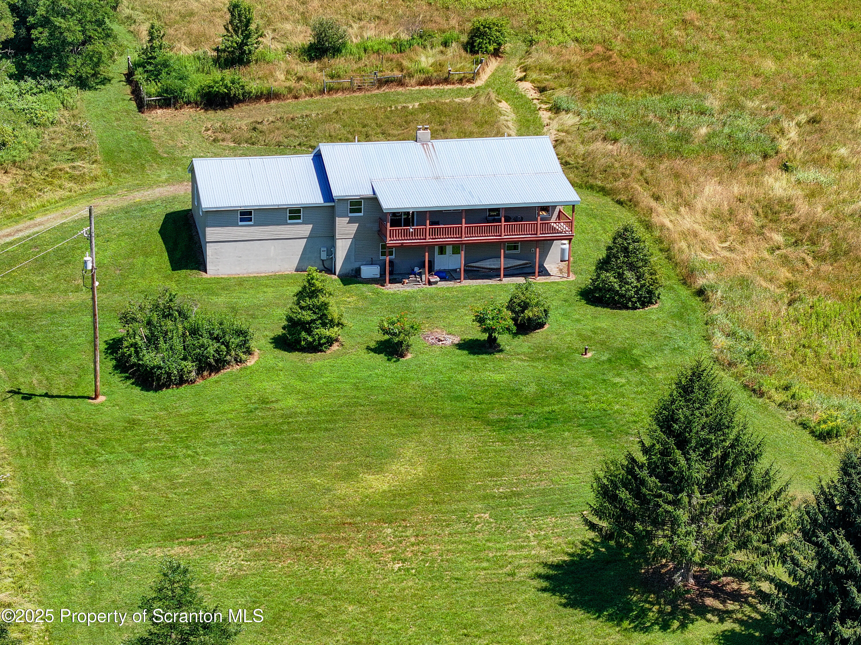 5290 Irish Hill Road Montrose, PA 18801 - Photo 53 of 67 a aerial view of a house with big yard