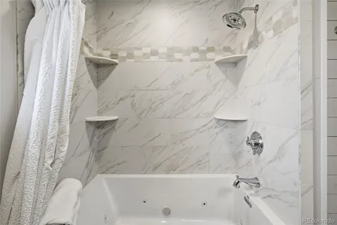 a bathroom with a bathtub