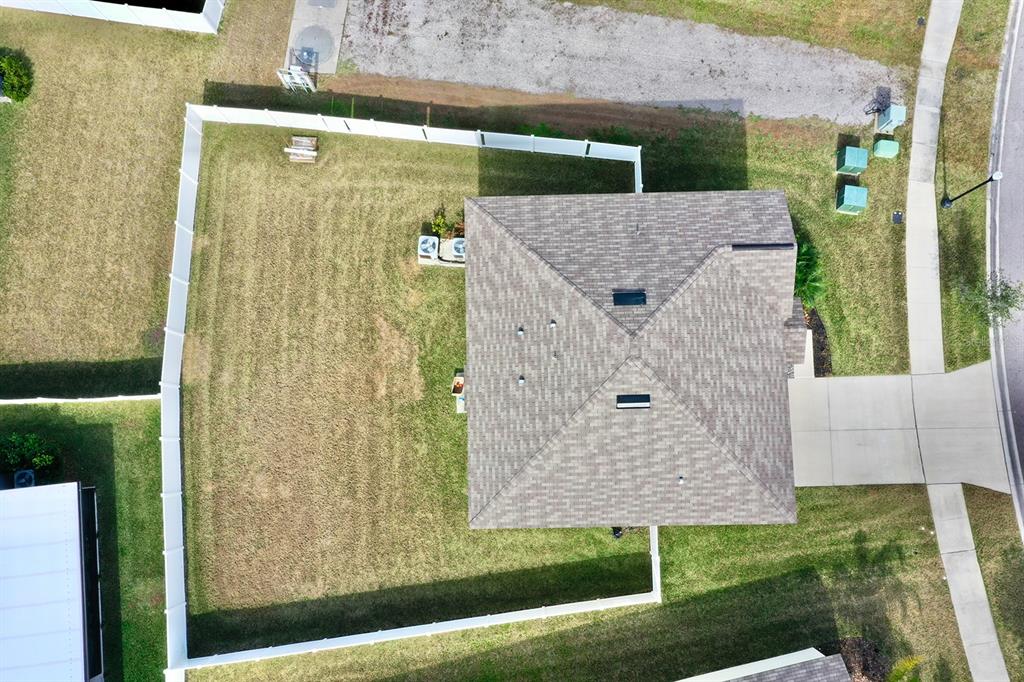 3059 Nubbin Ridge Lane Zephyrhills, FL 33540 - Photo 18 of 22 a view of a backyard
