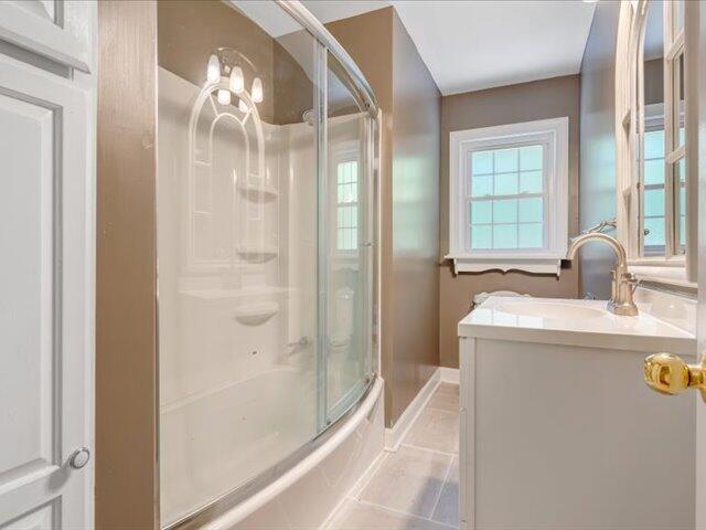 5828 Henry Road Henry, VA 24102 - Photo 16 of 58 a bathroom with a tub and shower