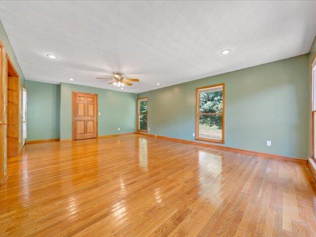 5828 Henry Road Henry, VA 24102 - Photo 21 of 58 a view of empty room with wooden floor