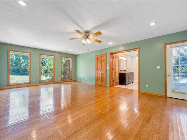 5828 Henry Road Henry, VA 24102 - Photo 24 of 58 a view of an empty room with window and wooden floor
