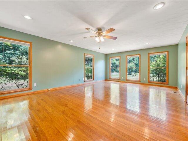 5828 Henry Road Henry, VA 24102 - Photo 25 of 58 a view of empty room with wooden floor and fan