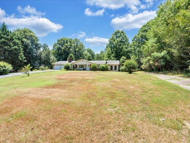 5828 Henry Road Henry, VA 24102 - Photo 47 of 58 a view of a swimming pool with an outdoor seating and a garden