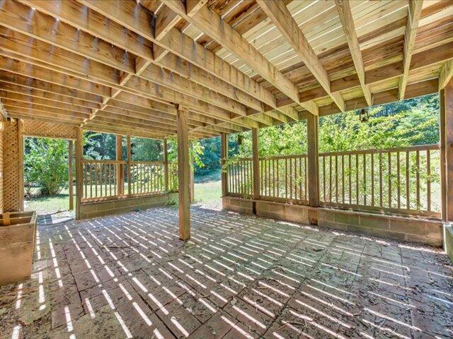 5828 Henry Road Henry, VA 24102 - Photo 53 of 58 a porch with a wooden fence