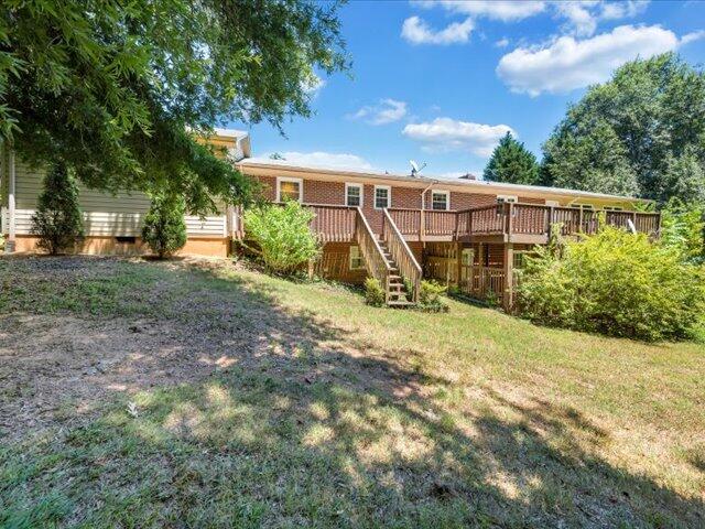 5828 Henry Road Henry, VA 24102 - Photo 58 of 58 a view of a house with backyard and sitting area