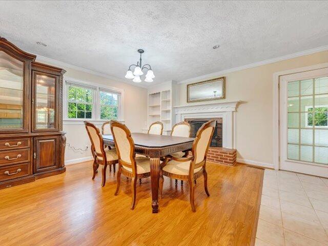 5828 Henry Road Henry, VA 24102 - Photo 7 of 58 a view of a dining room with furniture and wooden floor