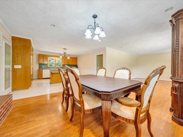 5828 Henry Road Henry, VA 24102 - Photo 9 of 58 a view of a dining room with furniture and wooden floor