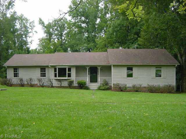 8473 Stafford Mill Road Oak Ridge, NC 27310 - Photo 1 of 1 Exterior Front. 8473 stafford mill Road with new exterior stain and paint