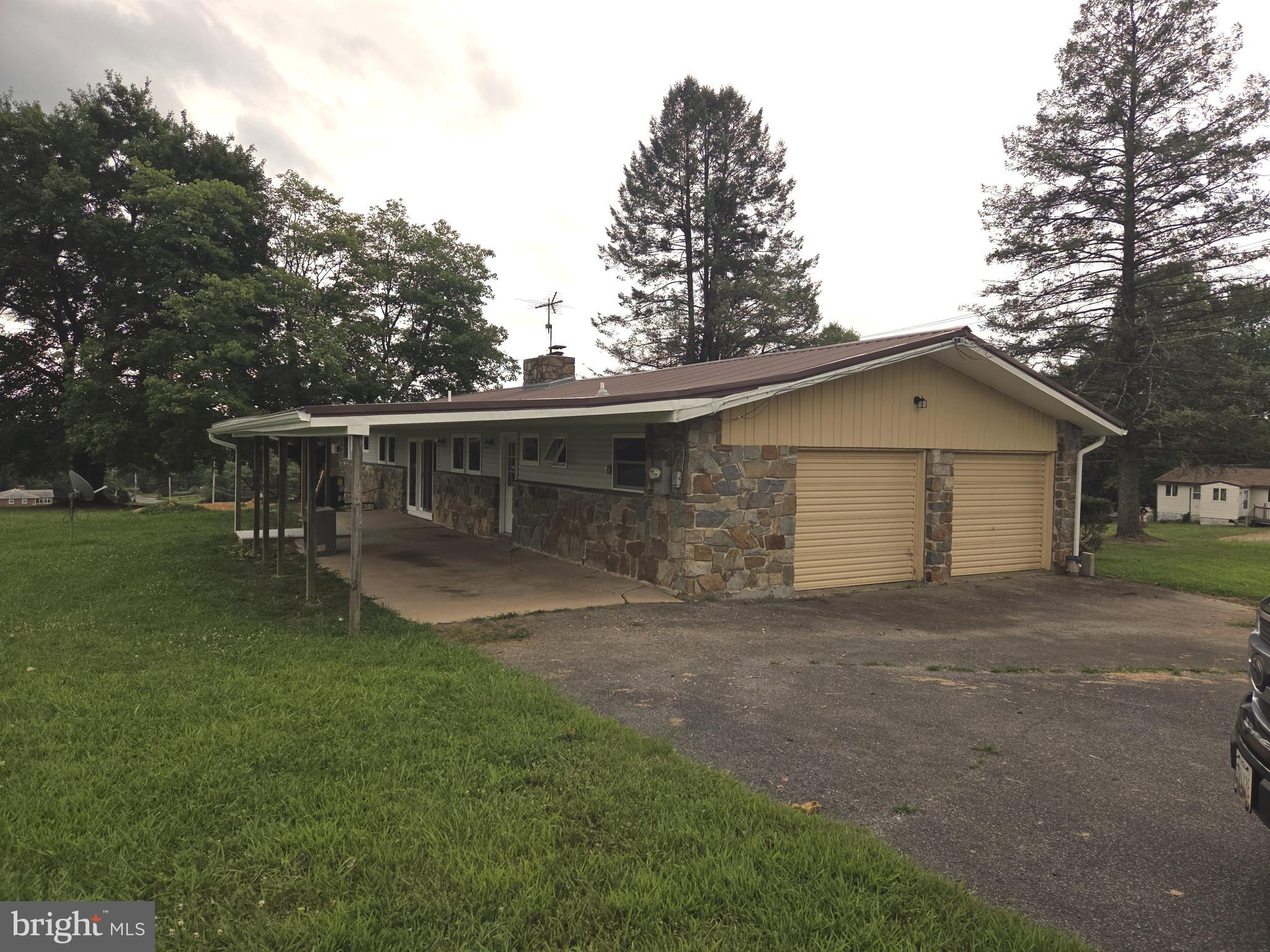 2264 Blue Ball Road Elkton, MD 21921 - Photo 3 of 27 a front view of house with yard and green space