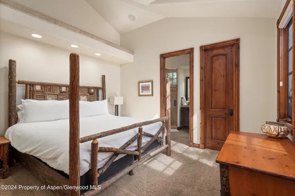 a bedroom with furniture