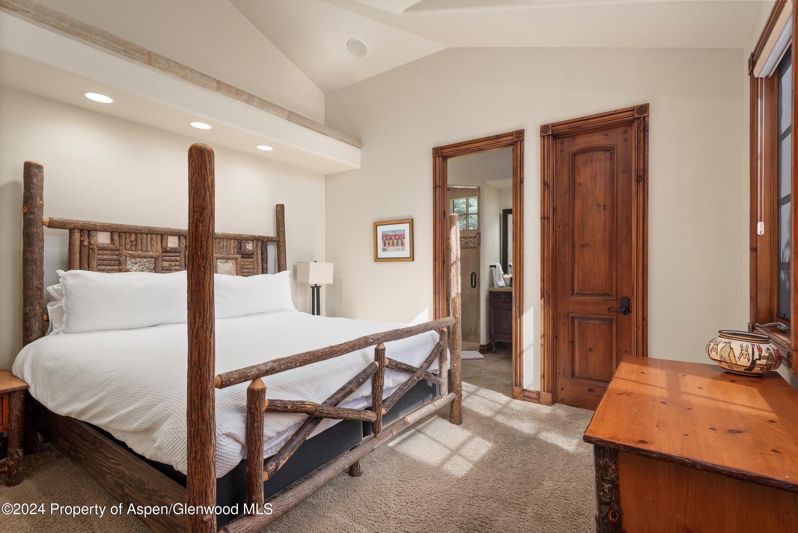 71 Meadow Road Snowmass Village, CO 81615 - Photo 30 of 48 a bedroom with furniture