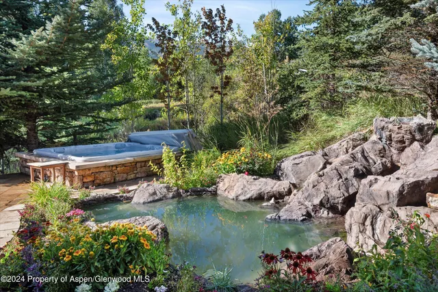 a view of lake with green space