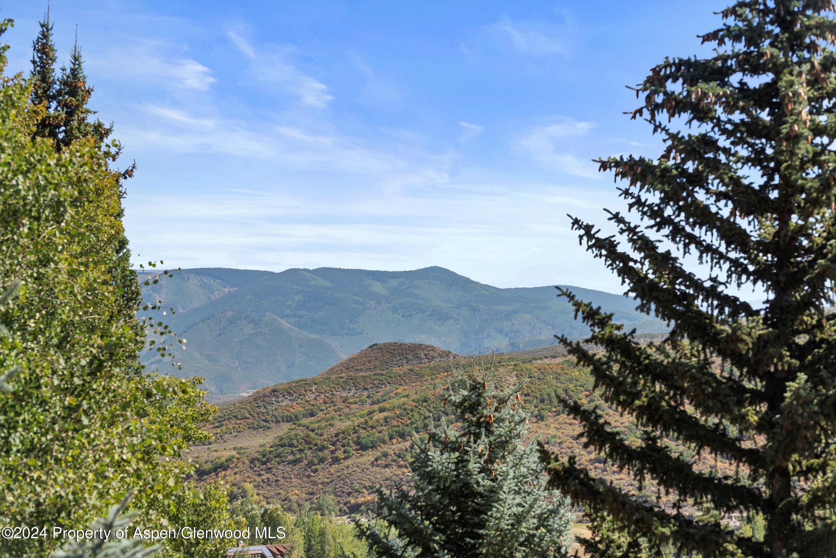 71 Meadow Road Snowmass Village, CO 81615 - Photo 44 of 48 a view of mountain with sunset