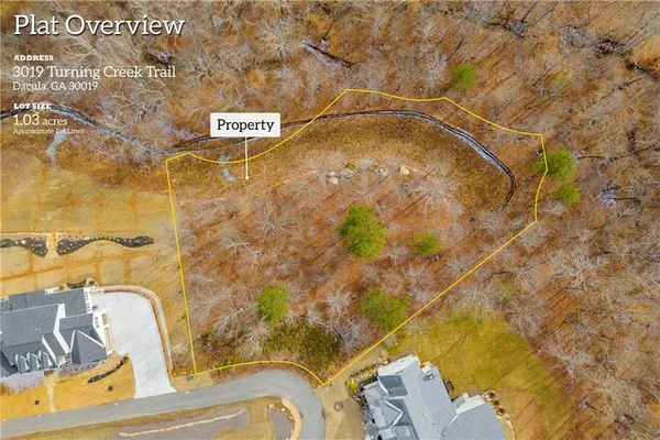 a bathroom with a sink mirror and toilet
