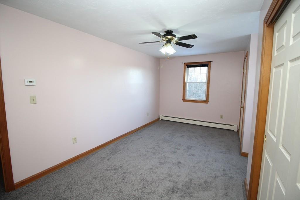69 Bear Hill Road Gardner, MA 01440 - Photo 21 of 41 a view of a livingroom with a ceiling fan and window