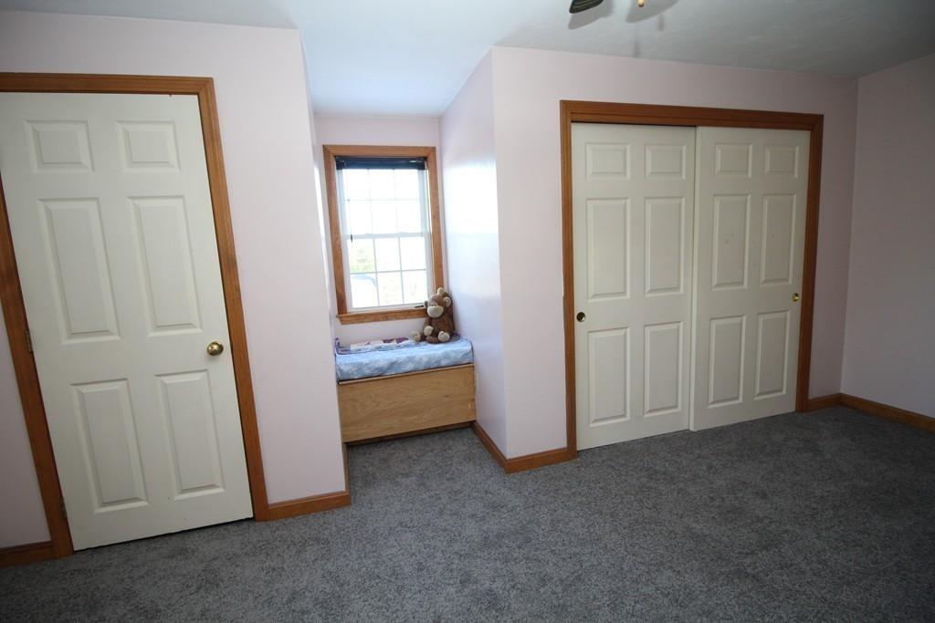 69 Bear Hill Road Gardner, MA 01440 - Photo 22 of 41 an empty room with windows