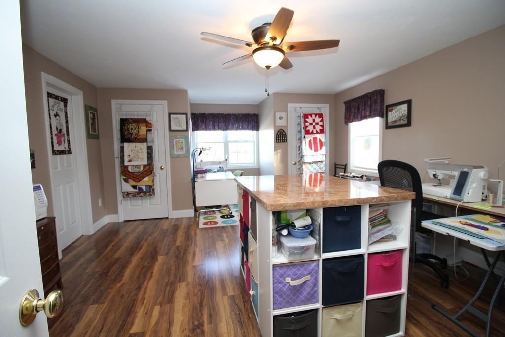 69 Bear Hill Road Gardner, MA 01440 - Photo 29 of 41 a view of a dining room with furniture and wooden floor