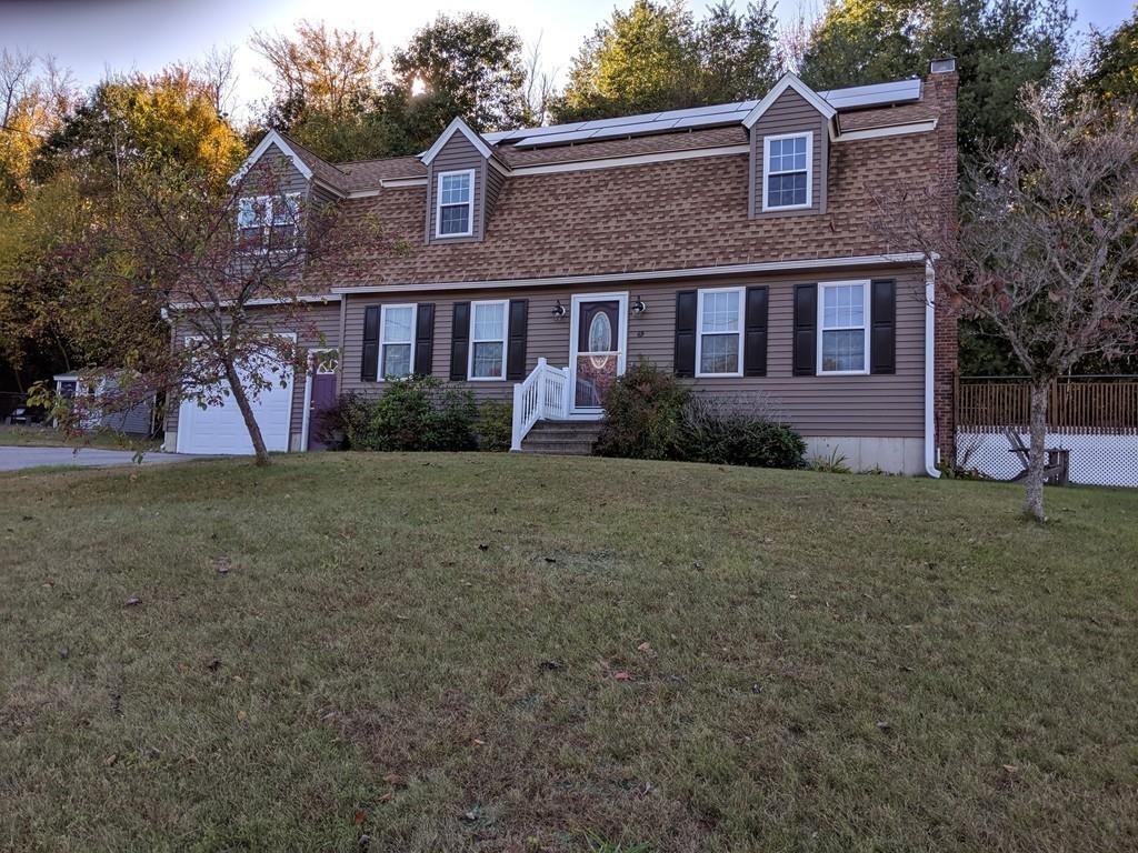 69 Bear Hill Road Gardner, MA 01440 - Photo 3 of 41 a front view of a house with a yard