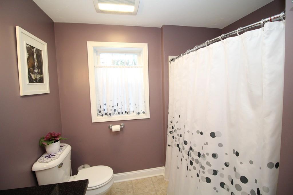 69 Bear Hill Road Gardner, MA 01440 - Photo 32 of 41 a bathroom with a toilet sink and mirror