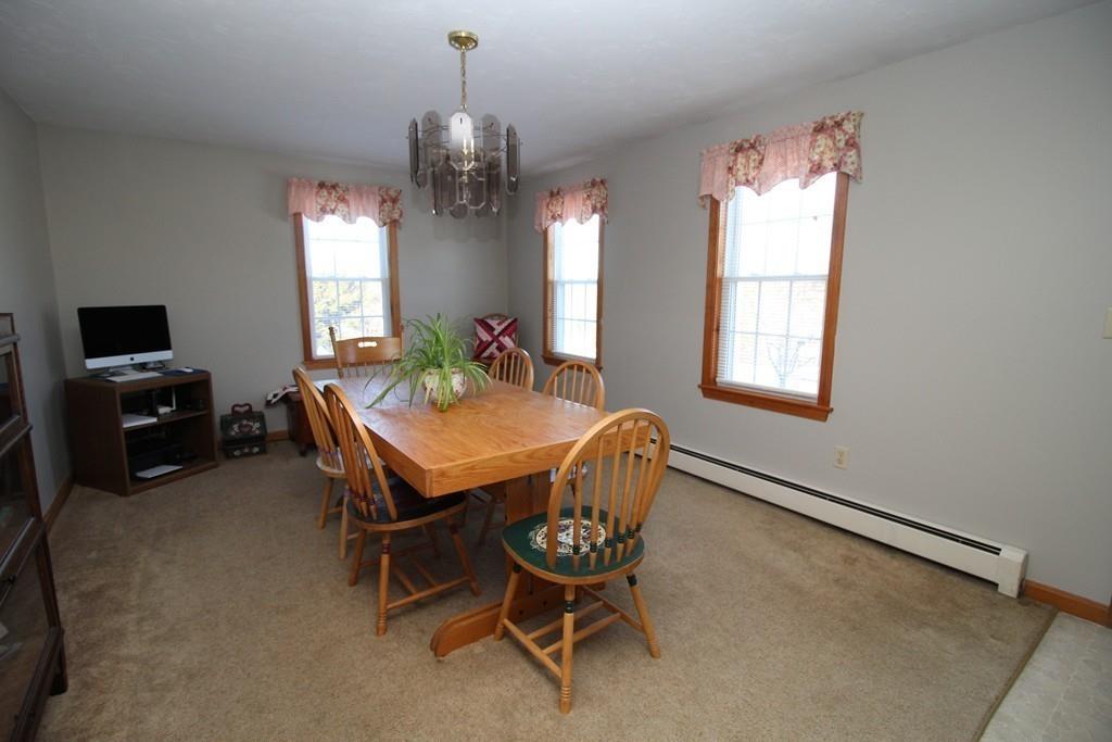 69 Bear Hill Road Gardner, MA 01440 - Photo 6 of 41 a view of a dining room with furniture and window