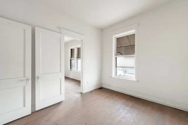 an empty room with windows