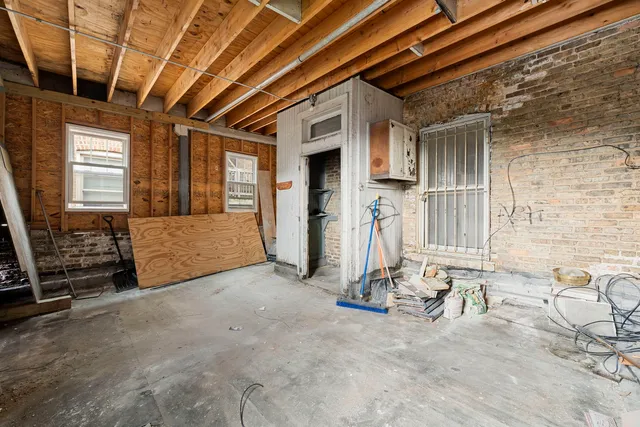 a view of a house with a street