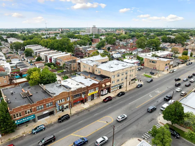 an aerial view of a city with lots of residential buildings